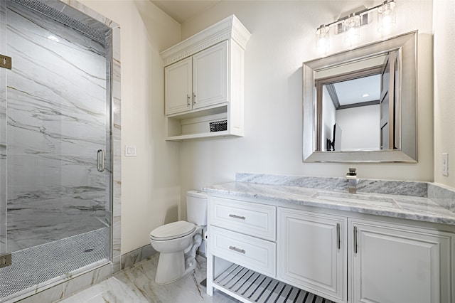 bathroom with vanity, an enclosed shower, and toilet