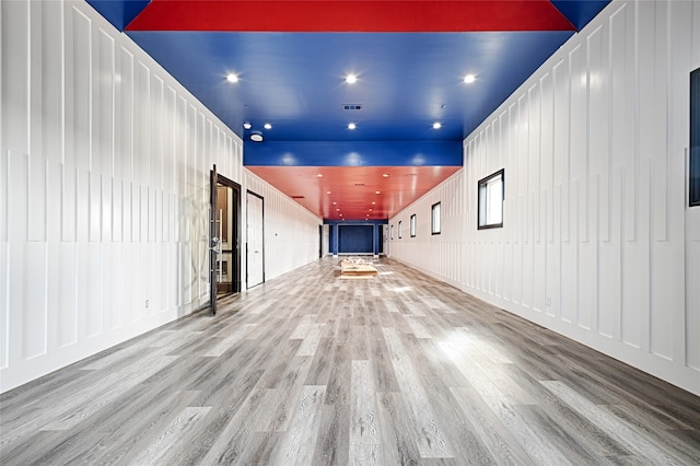 unfurnished living room featuring light hardwood / wood-style flooring