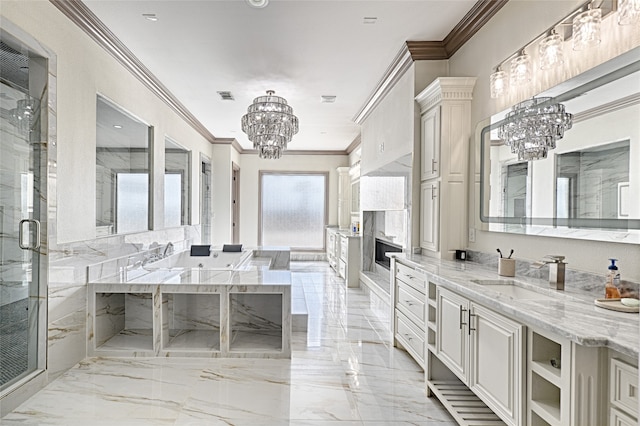 bathroom with a chandelier, vanity, walk in shower, and ornamental molding