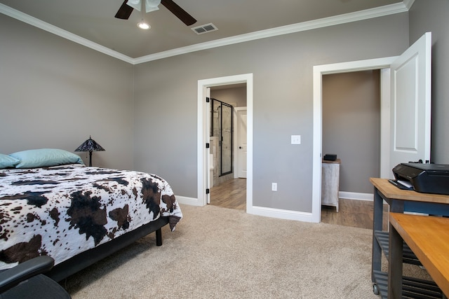 carpeted bedroom featuring ceiling fan and ornamental molding