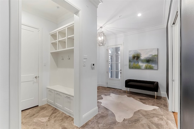 mudroom featuring crown molding and an inviting chandelier