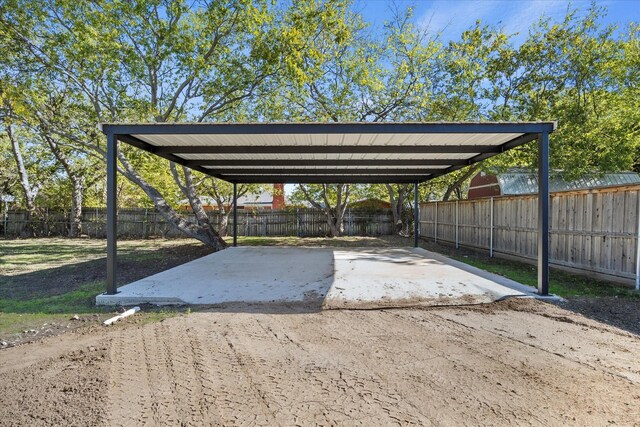 view of yard featuring a patio and a carport