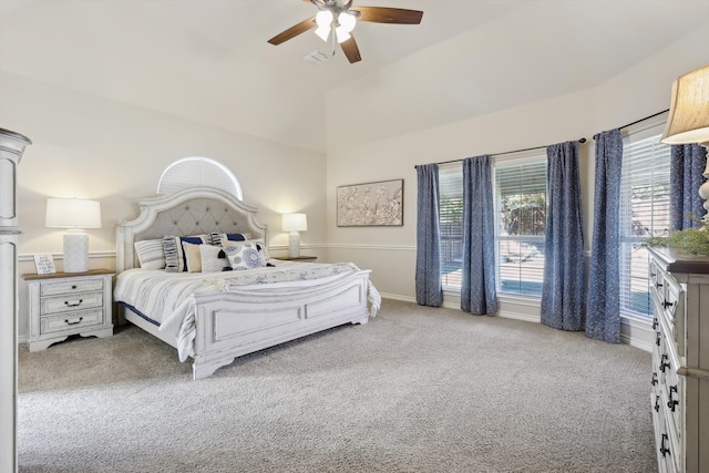 bedroom with light carpet, ceiling fan, and lofted ceiling