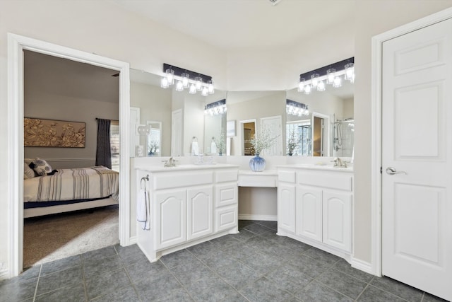 bathroom with vanity and a shower with shower door