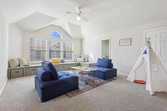 carpeted living room featuring ceiling fan and lofted ceiling