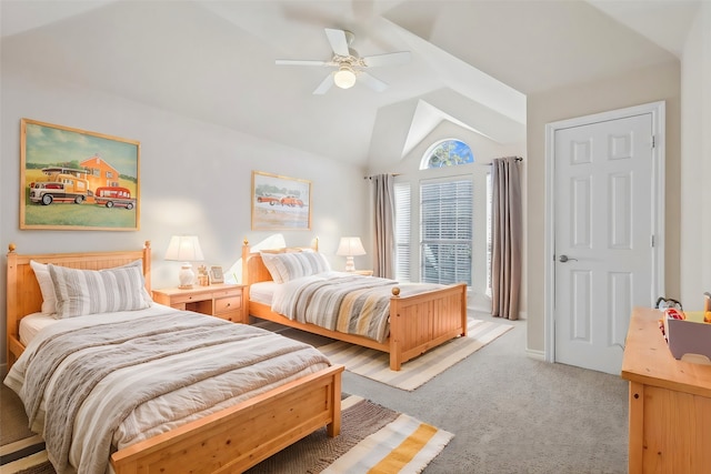 bedroom featuring ceiling fan, light colored carpet, and vaulted ceiling