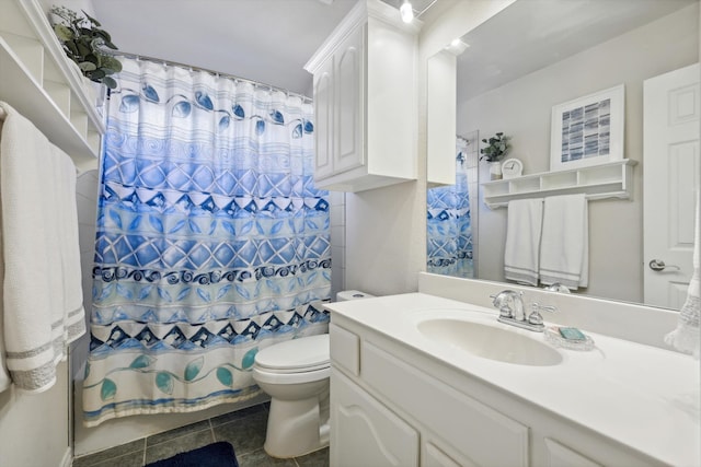 bathroom featuring tile patterned floors, a shower with curtain, vanity, and toilet