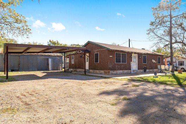 view of front of house with a carport