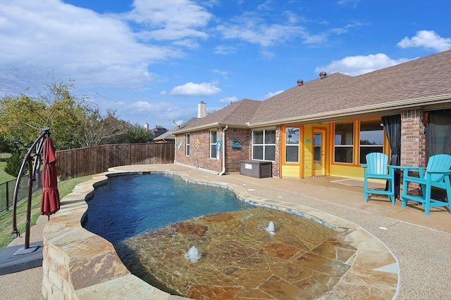 view of pool featuring a patio