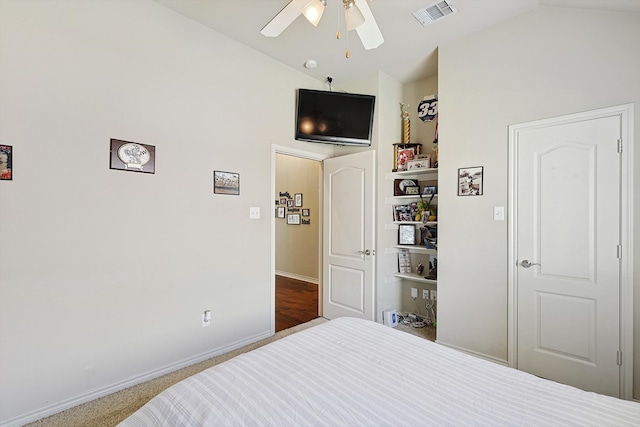 bedroom featuring carpet flooring, ceiling fan, and vaulted ceiling