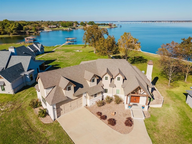 drone / aerial view featuring a water view