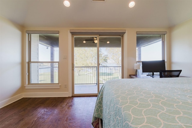 bedroom with access to exterior, dark wood finished floors, recessed lighting, visible vents, and baseboards