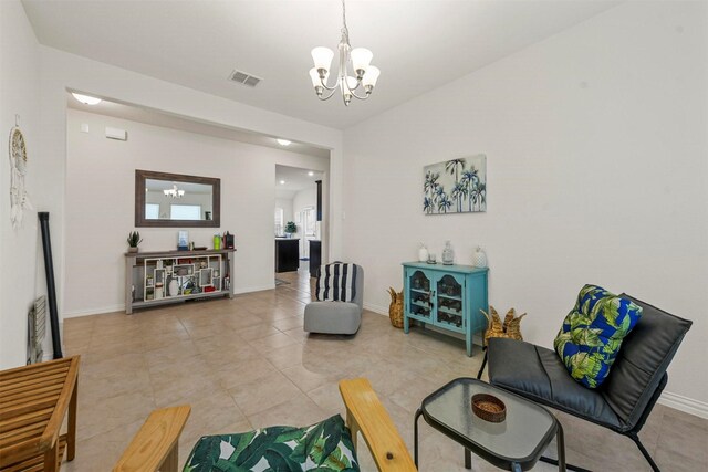 dining area featuring lofted ceiling and light tile patterned floors