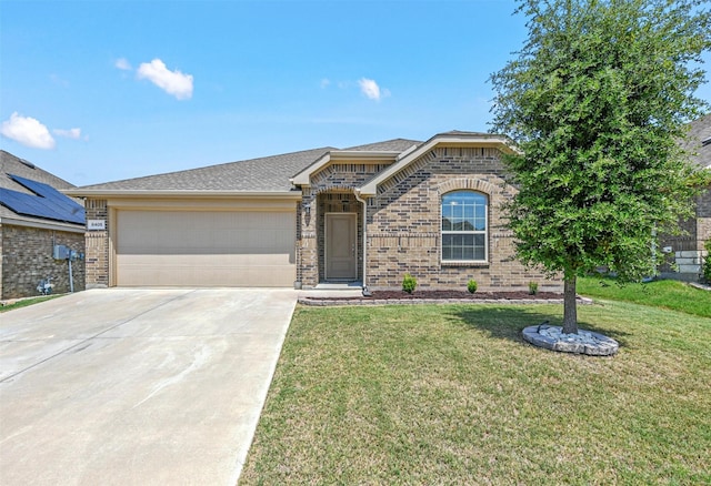 ranch-style home featuring brick siding, an attached garage, concrete driveway, and a front lawn