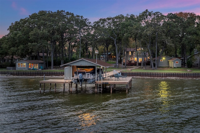 dock area with a water view