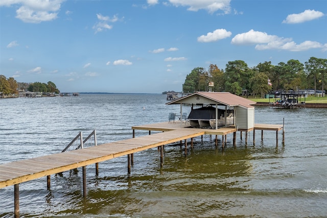 view of dock with a water view