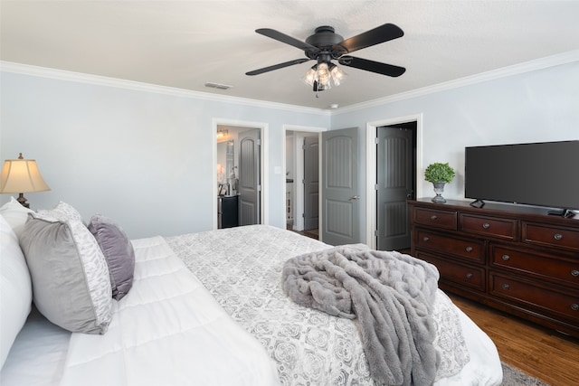 bedroom featuring dark hardwood / wood-style flooring, ceiling fan, and ornamental molding