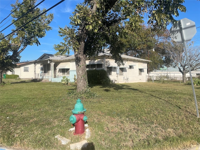 exterior space with a yard