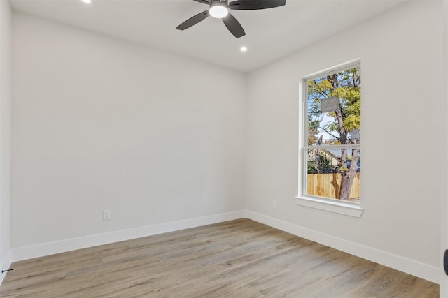 empty room featuring light hardwood / wood-style floors and ceiling fan