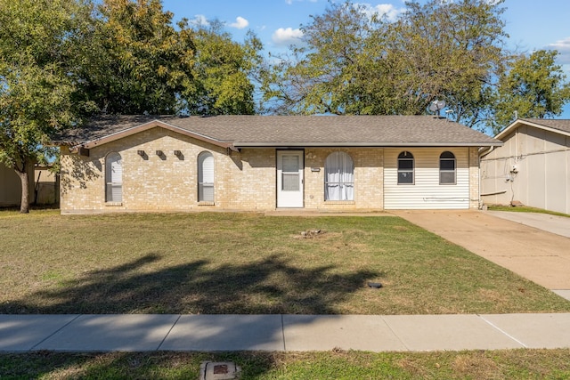 ranch-style home with a front lawn