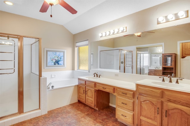 bathroom with vanity, ceiling fan, lofted ceiling, and independent shower and bath