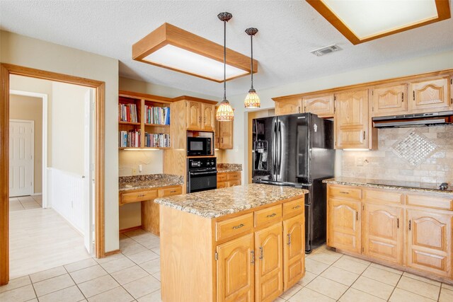 kitchen with decorative backsplash, exhaust hood, black appliances, pendant lighting, and a kitchen island