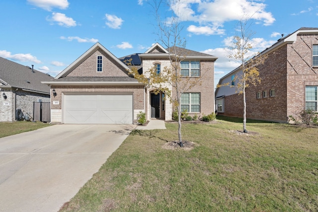 view of front of property with a garage and a front yard