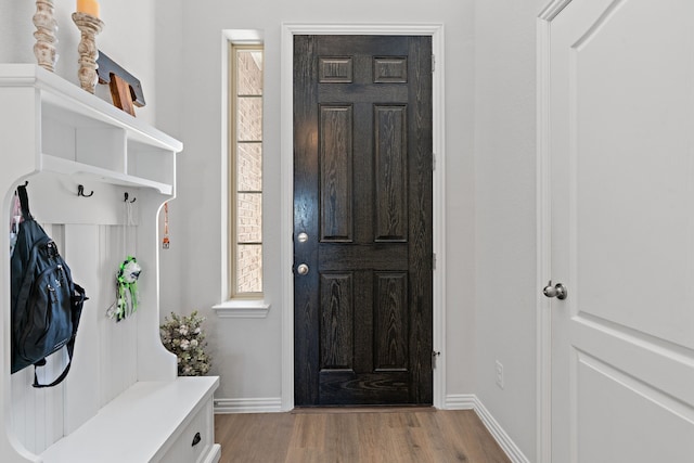 mudroom with light hardwood / wood-style flooring