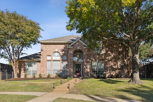 view of front of house featuring a front lawn