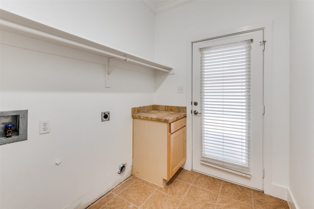 laundry area with washer hookup, crown molding, and electric dryer hookup