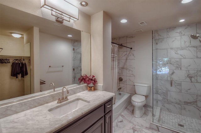 bathroom featuring vanity, toilet, and a tile shower