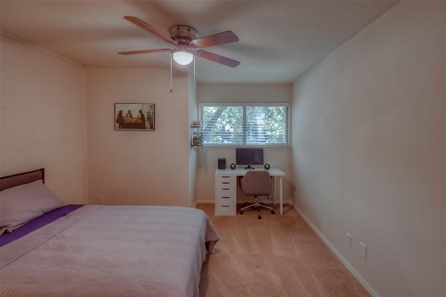 bedroom with ceiling fan and light colored carpet