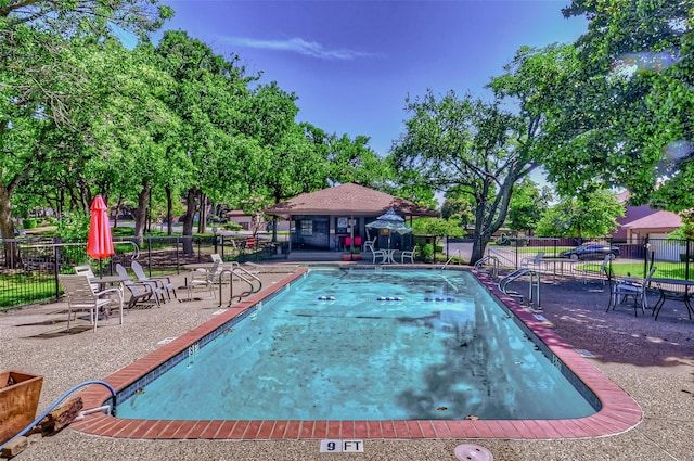 view of pool featuring a patio area