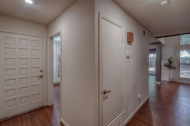 entryway with hardwood / wood-style flooring