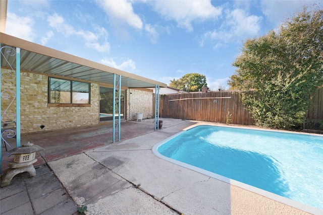 view of pool featuring a patio