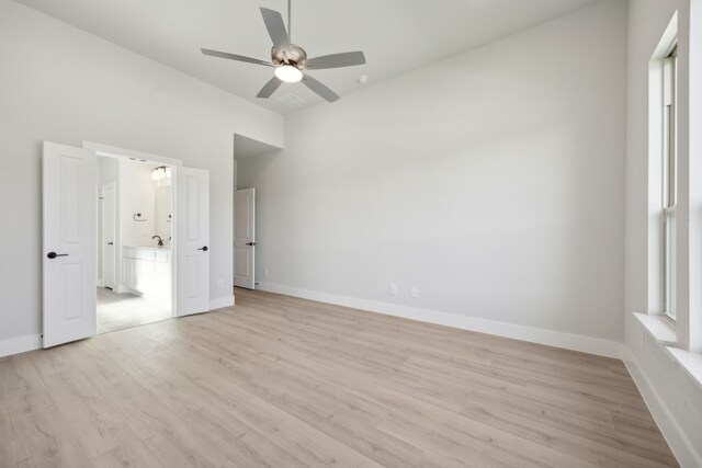 unfurnished bedroom with light hardwood / wood-style flooring and ceiling fan