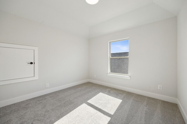 unfurnished room featuring carpet flooring