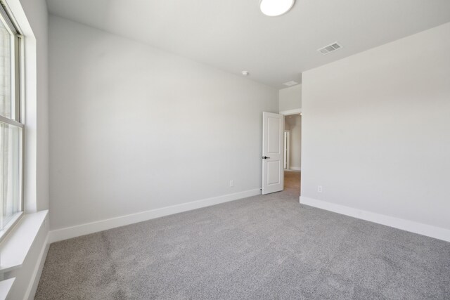 spare room with carpet flooring