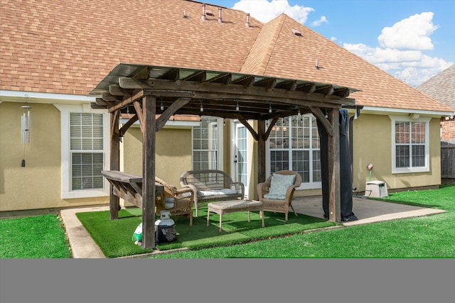 back of property featuring a pergola and a patio