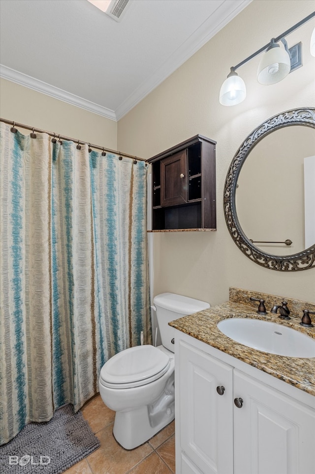 bathroom featuring vanity, tile patterned floors, and crown molding