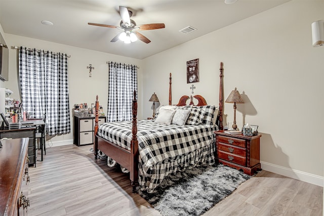 bedroom featuring ceiling fan and light wood-type flooring