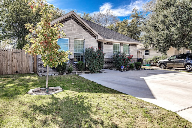 view of front of house with a front lawn