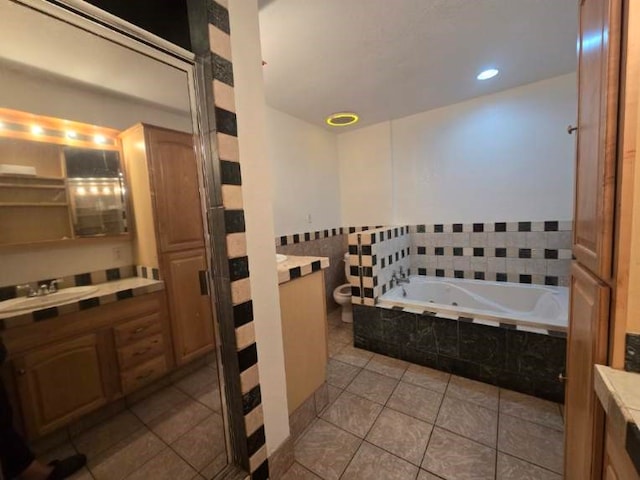 bathroom featuring tile patterned flooring, vanity, and toilet