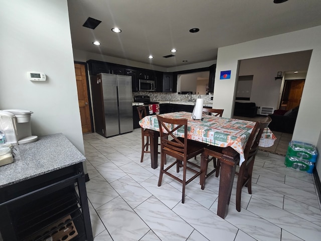 dining area with sink