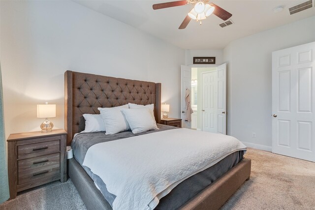 bedroom featuring ceiling fan, baseboards, and light carpet