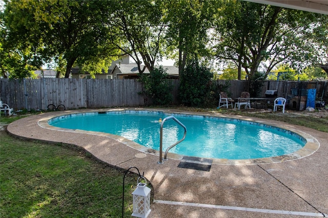 view of pool with a patio