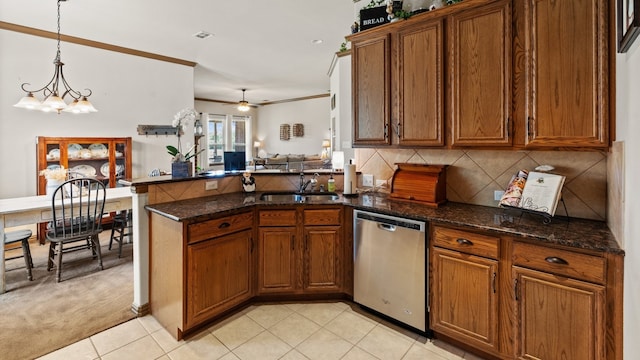 kitchen featuring dishwasher, sink, kitchen peninsula, light carpet, and ceiling fan with notable chandelier