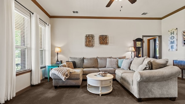 carpeted living room featuring ceiling fan and ornamental molding