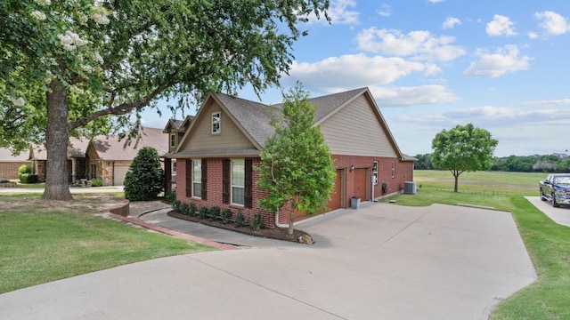 2045 Mason Pond Dr, Weatherford, TX 76085 - view of front facade featuring brick siding, a front lawn, cooling unit, driveway, and roof with shingles