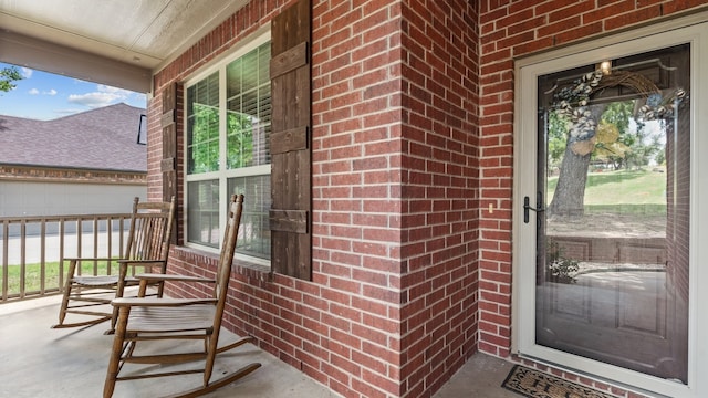 entrance to property with a porch